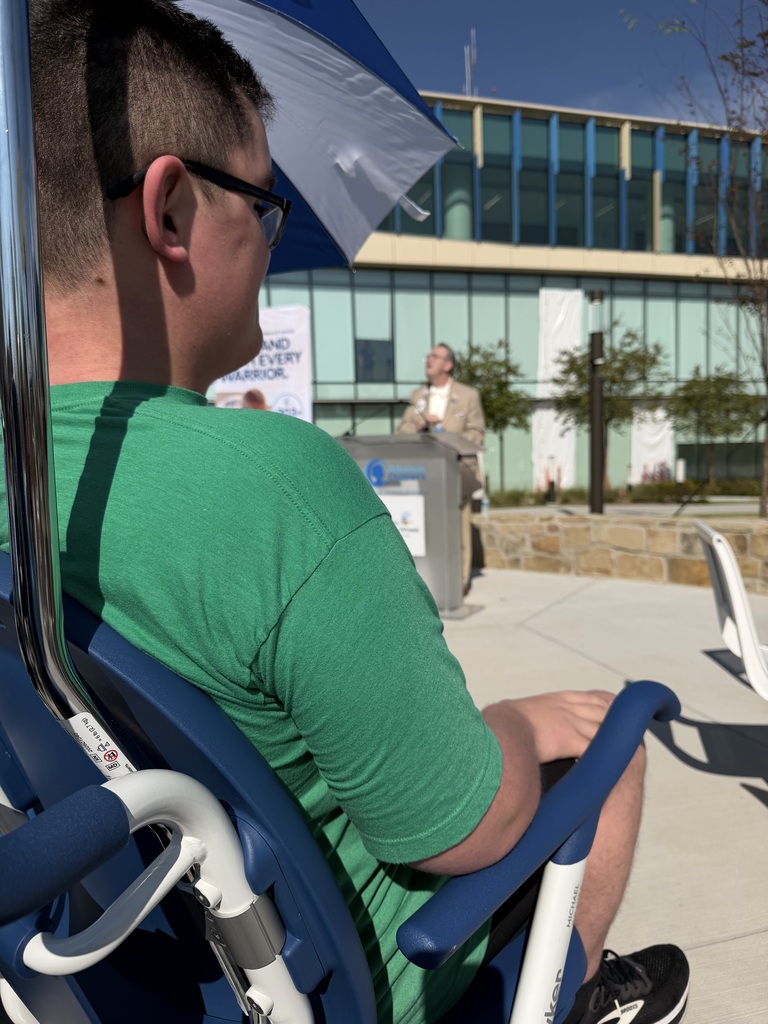 Barnes listening to a speaker during the event.
