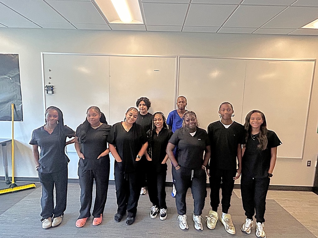High school students in their scrubs for class