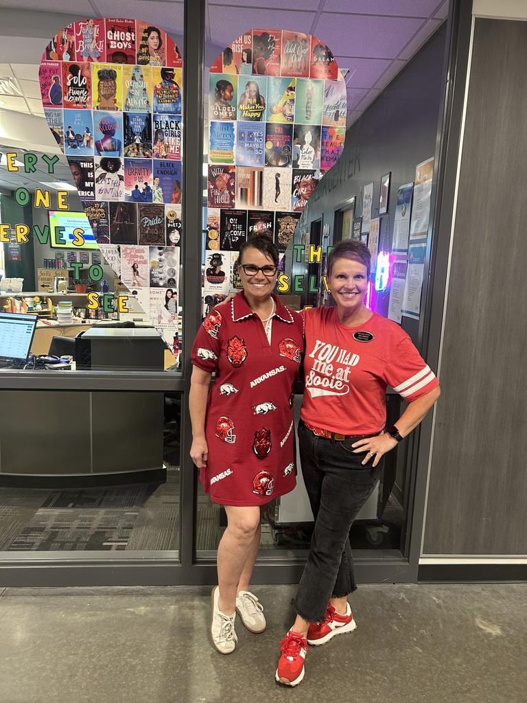Two teachers in Arkansas Razorback outfits