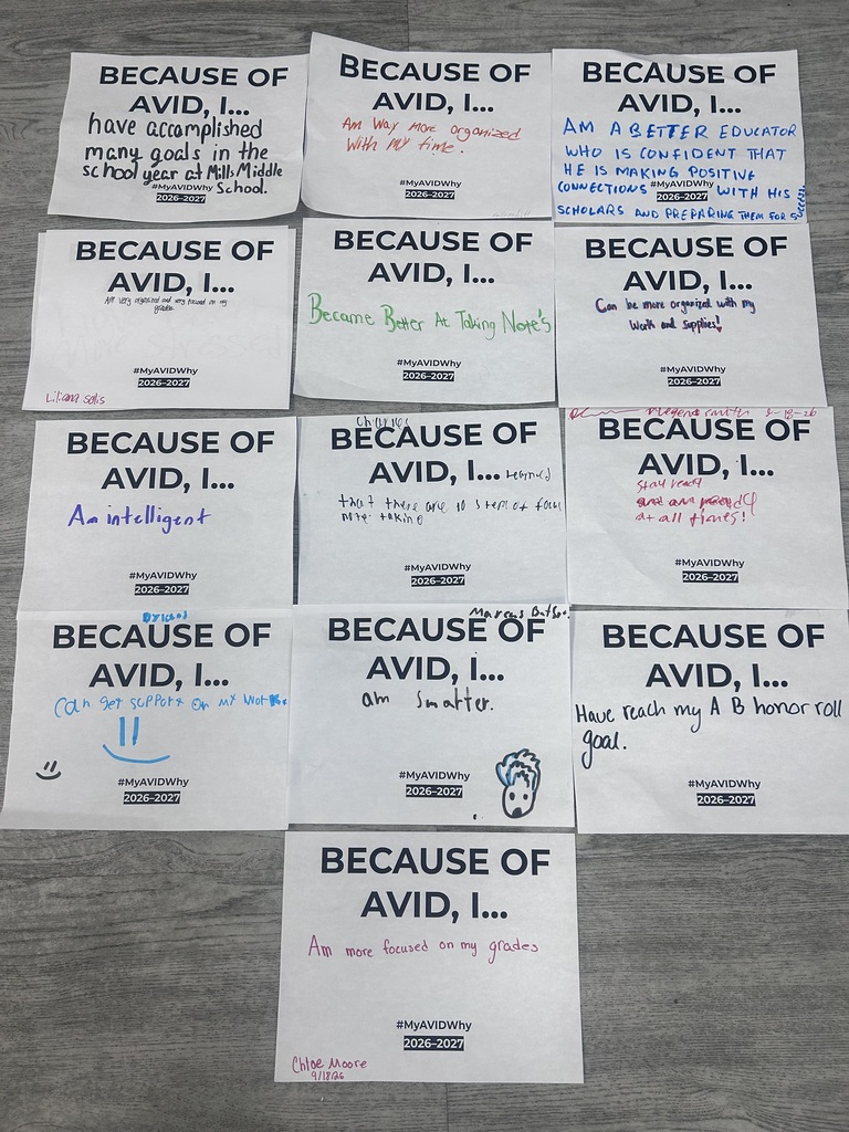 A group of Because of AVID, I signs completed by scholars