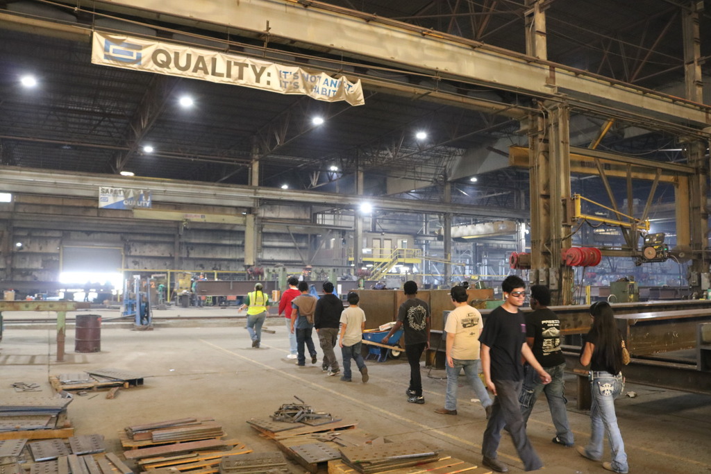 Lexicon industry tour. A sign says quality.