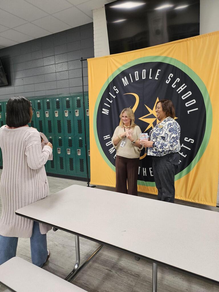Ms. Shelly being presented certificate for WICOR Teacher of the month