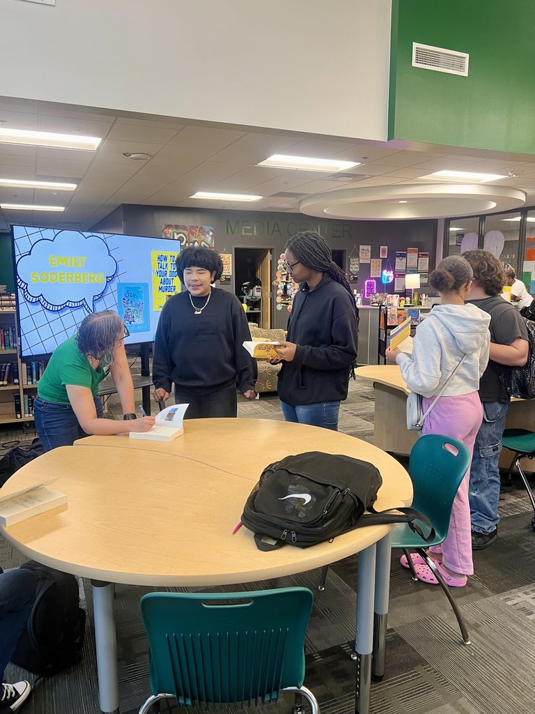 Students lined up to get books autographed by author