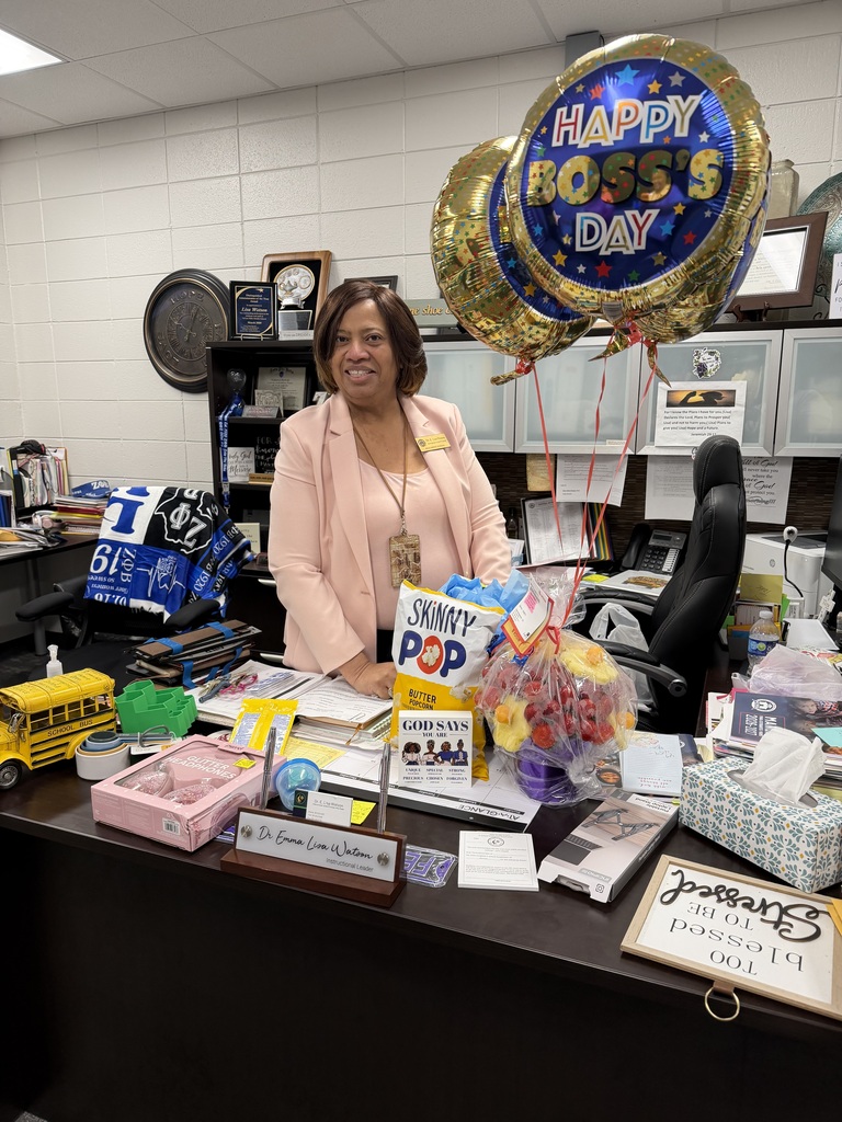 Picture of Dr. Watson with her Boss's Day gifts