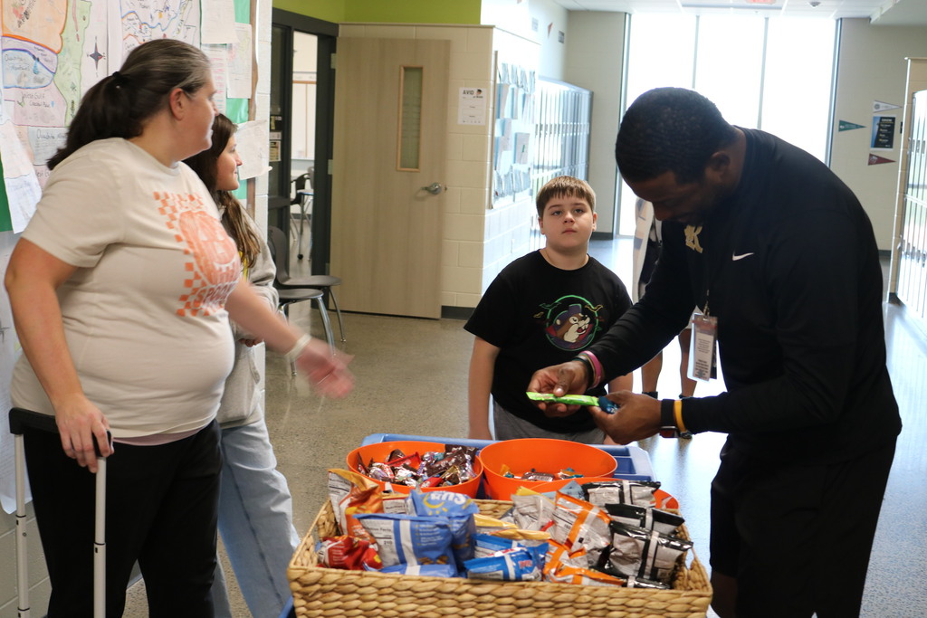 A PTO organization handing out snacks on a wagon
