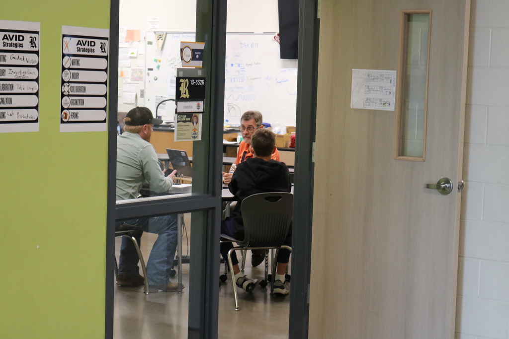 parent teacher conferences in a classroom