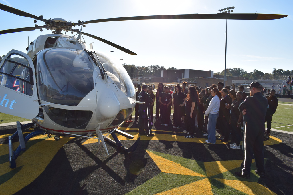 students tour a helicopter