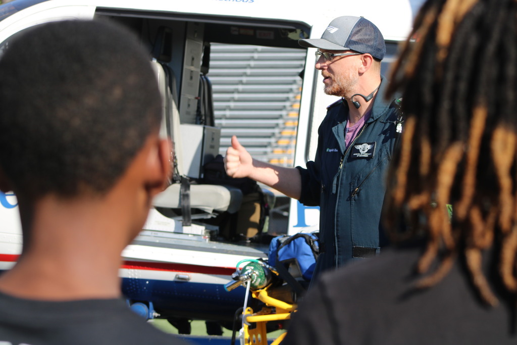 Students listen to a Medflight paramedic