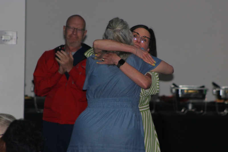 Washam hugging Dr. Janna Carr
