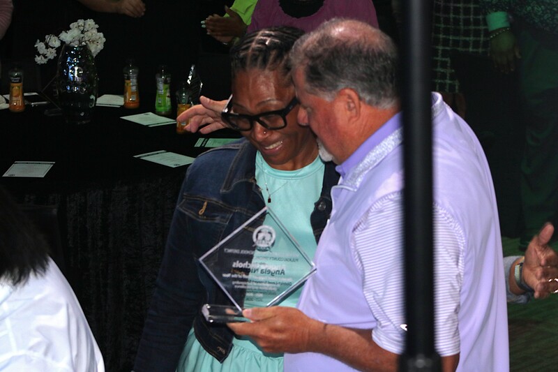 Senn and Angela Nichols hug