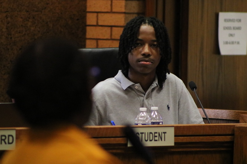 Reeder Henry listening to Dr. Janice Warren