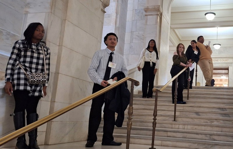 Students on the steps of the Arkansas State Capitol