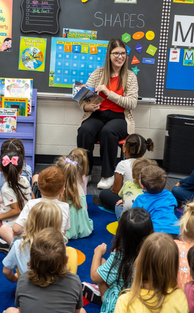 Mattie Carlile sharing her book with Pre-K  