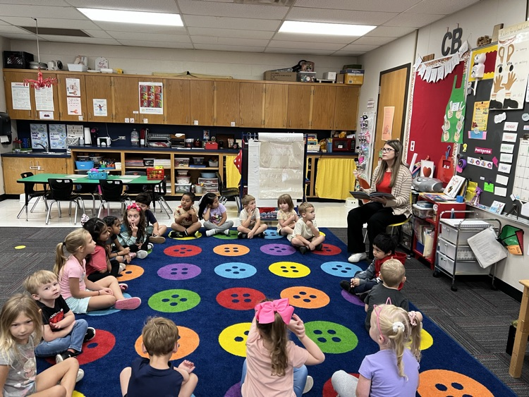 Mattie Carlile sharing her book with Pre-K. 