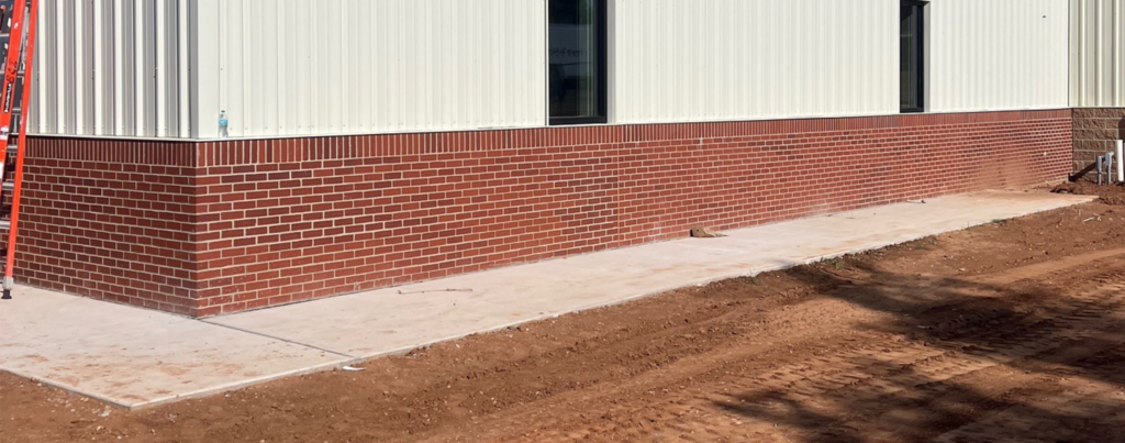 Exterior sidewalk around the Elementary gym.