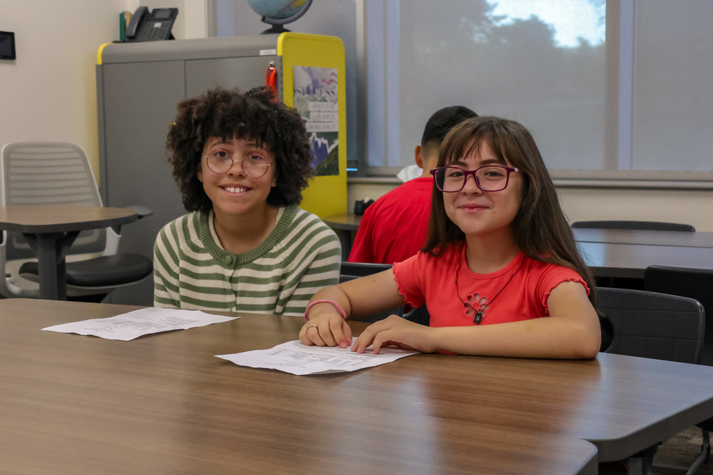 two students smiling