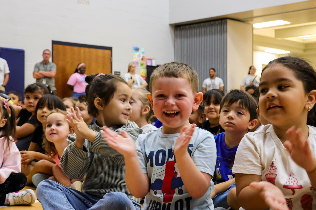 child clapping