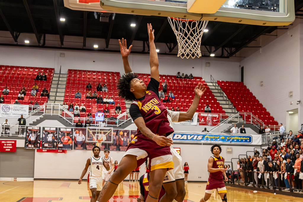 PCN Boys Basketball players block during the semi-final round