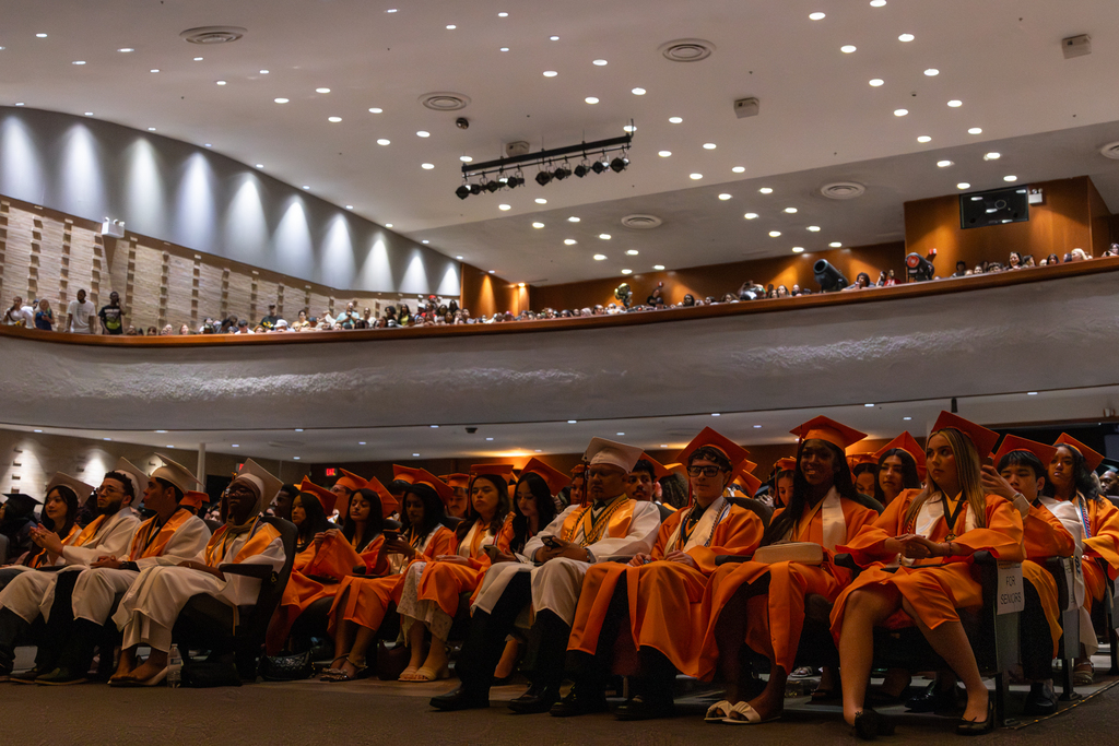 Students seated inside the Putnam City High School auditorium
