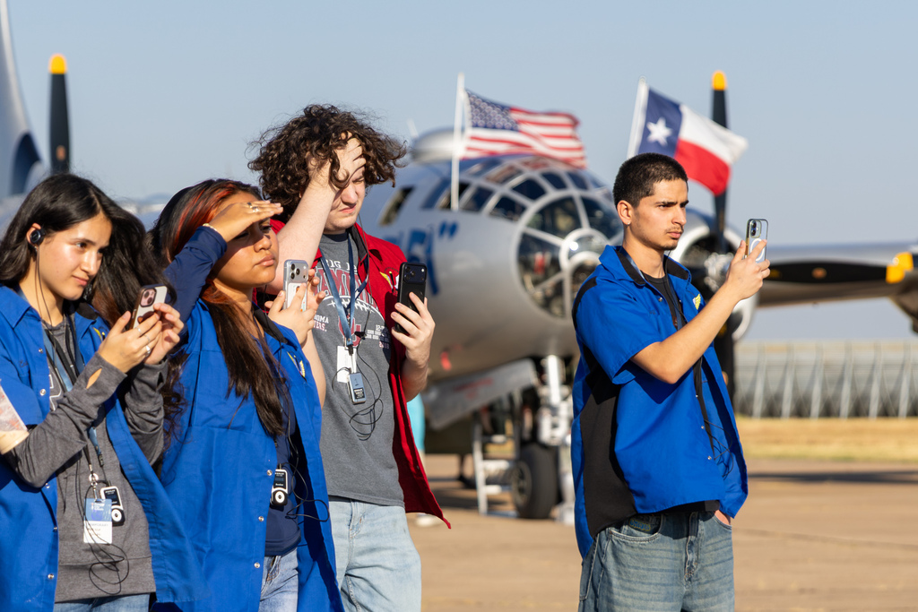 Putnam City Aviation students photograph the B-29 FIFI on the ramp.