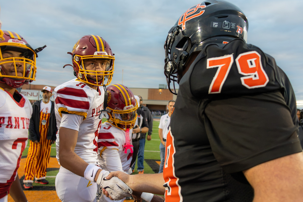 pch and pcn football players shake hands