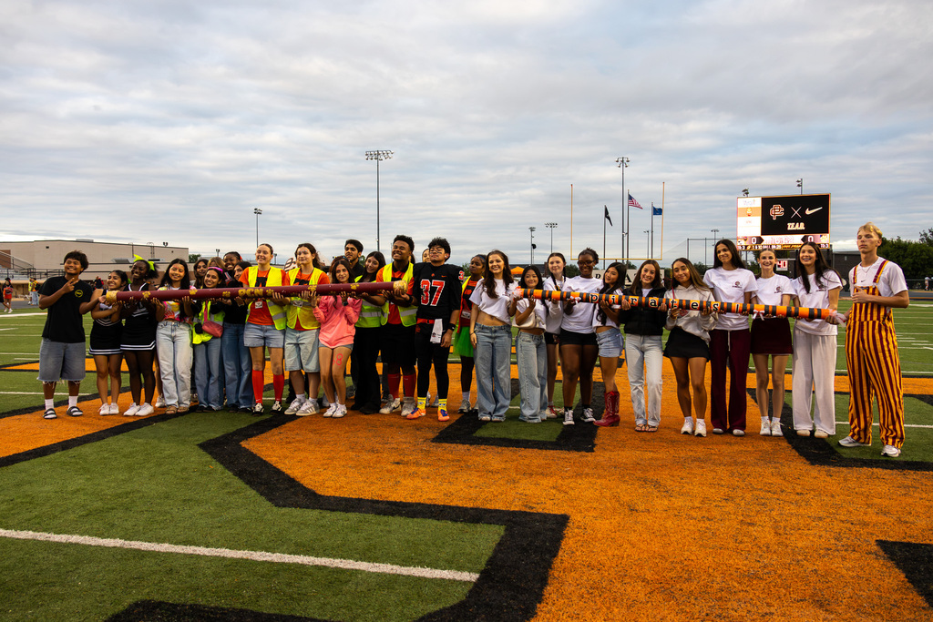 pch and pcn students exchange spirit sticks