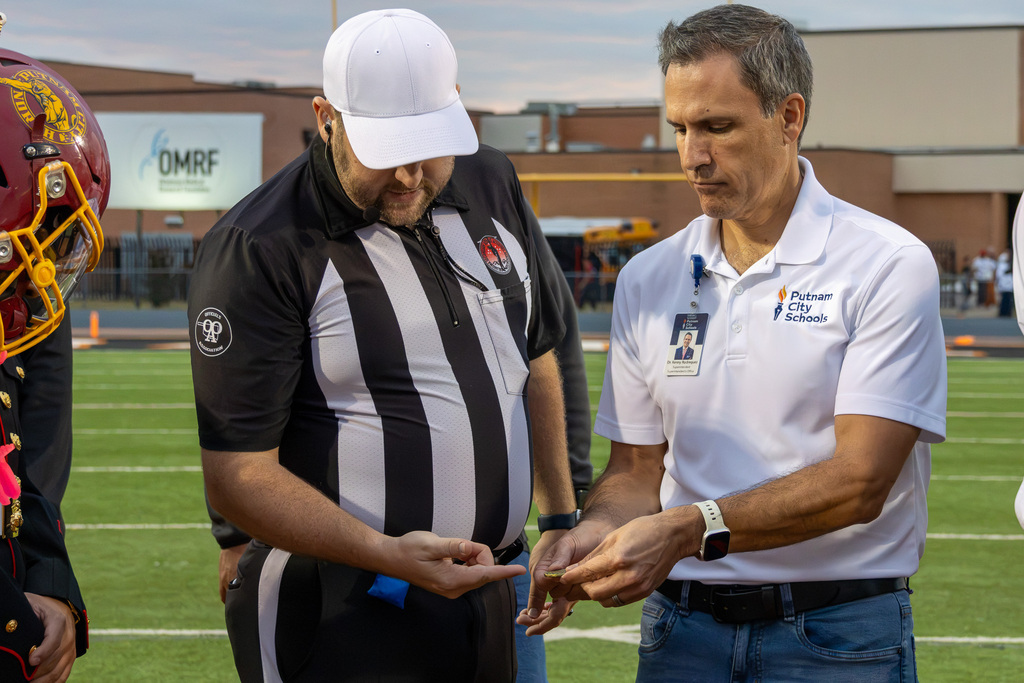 ref with superintendent rodrequez for coin flip