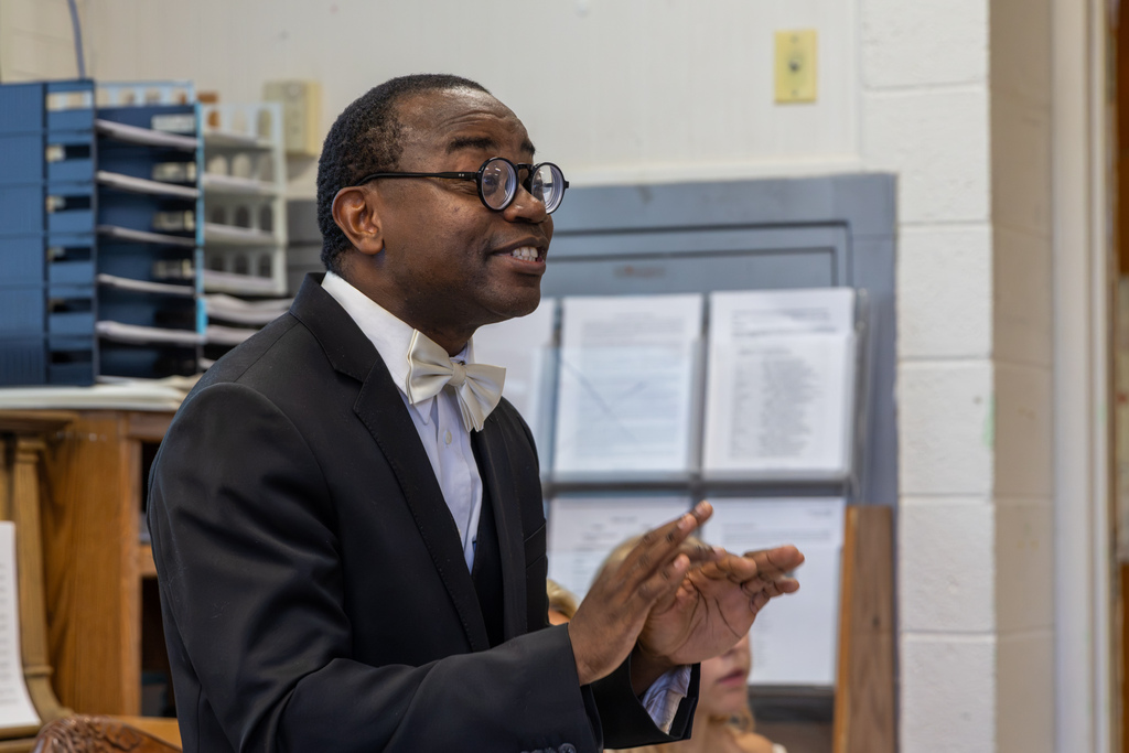 French teacher Dr. Nchumbonga George Lekelefac speaks to students and guests during the classroom presentation.