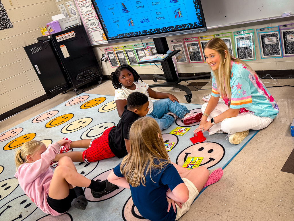PCPS teacher with students durnig small group
