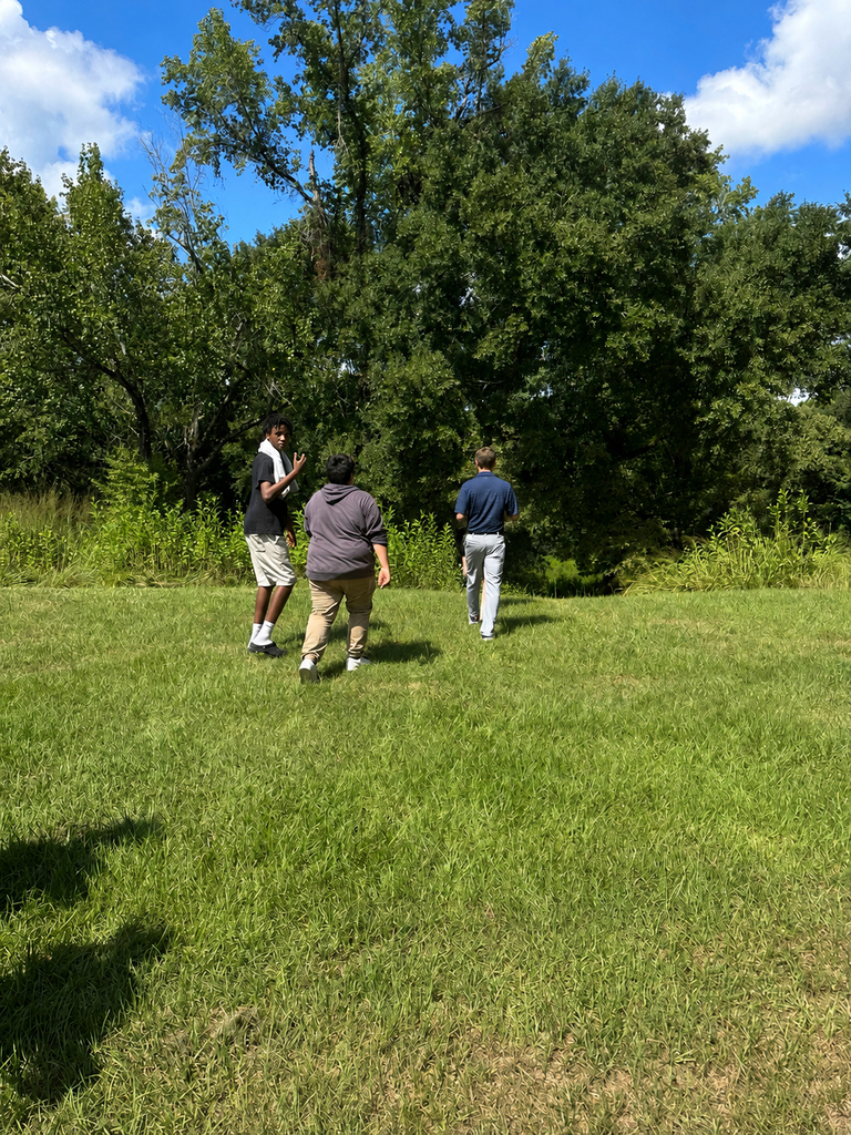 Students exploring Ocmugee Indian Mounds in Macon, Georgia