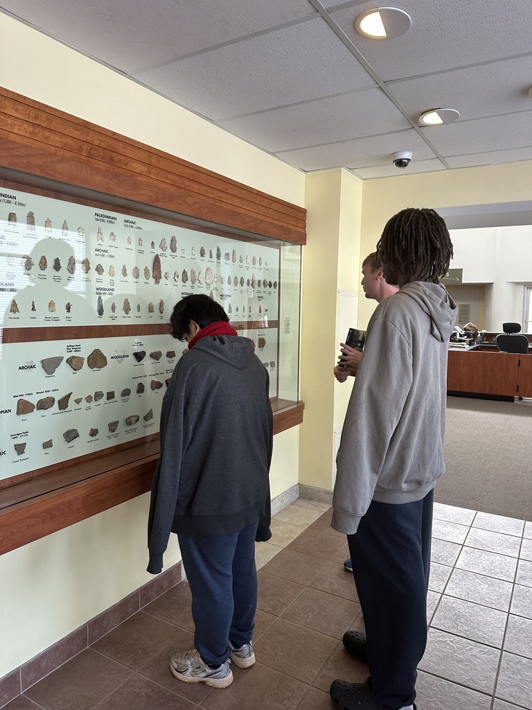Students viewing artifacts from the past.