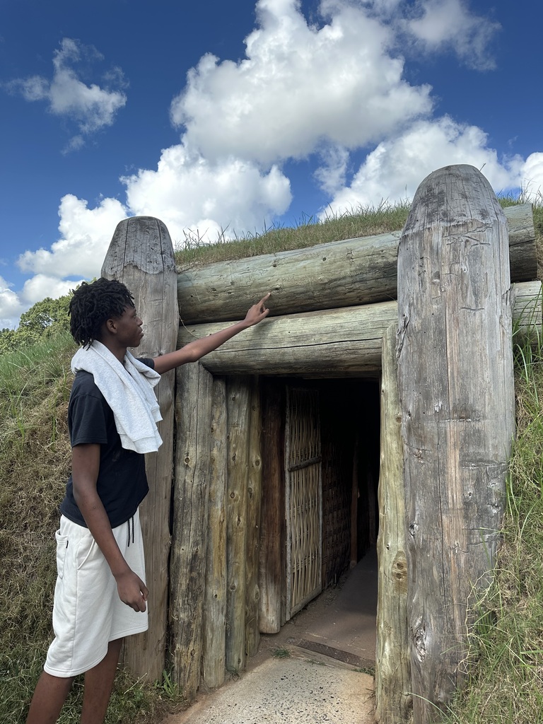 Student exploring the construction of the mound