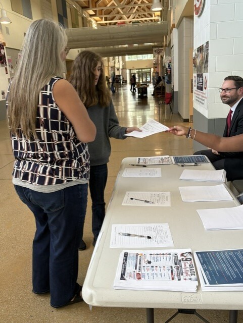 Students receiving their progress reports