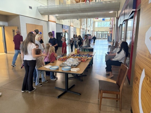 more families at the food table