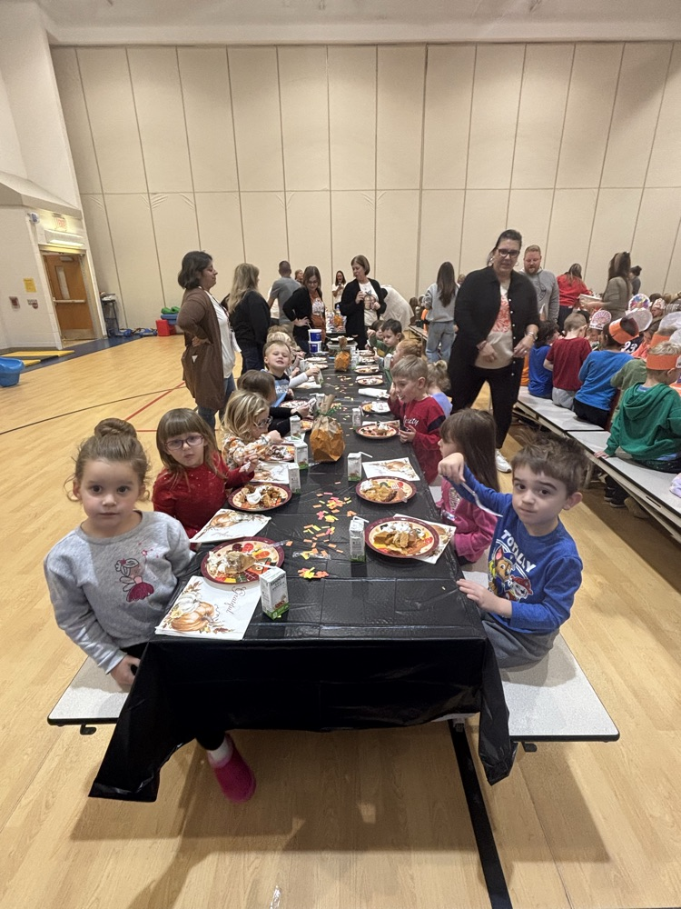 PCPS staff and students share pie.