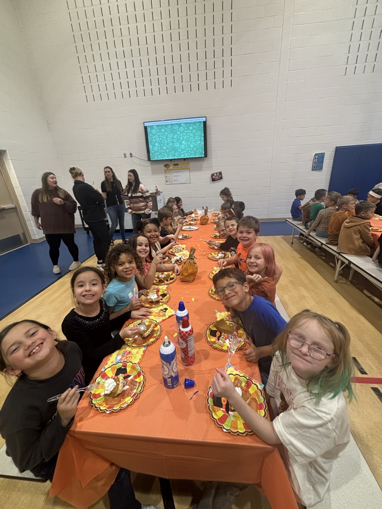 PCPS staff and students share pie.