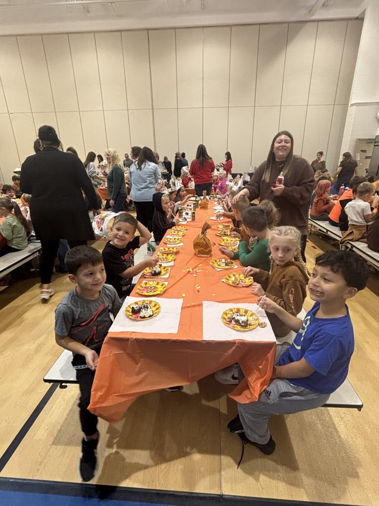 PCPS staff and students share pie.