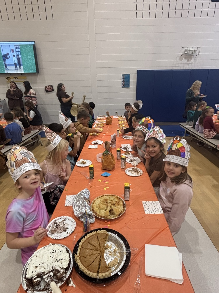 PCPS staff and students share pie.