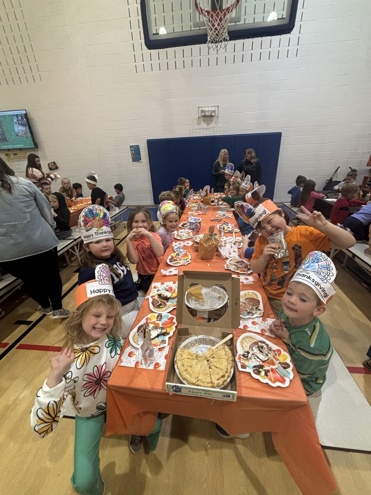 PCPS staff and students share pie.