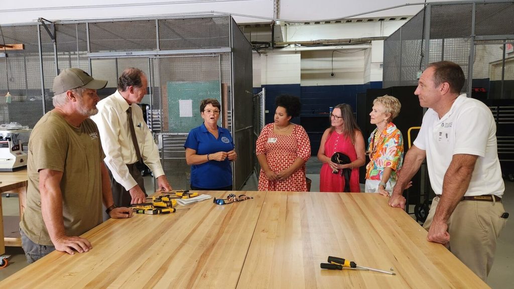 Partners around a construction table
