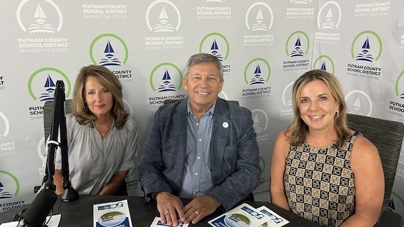 Michelle Sjogren (SJRSC) , Superintendent Rick Surrency (PCSD), and JoLynn Carter, St. Johns River State College ( FLO Arts).