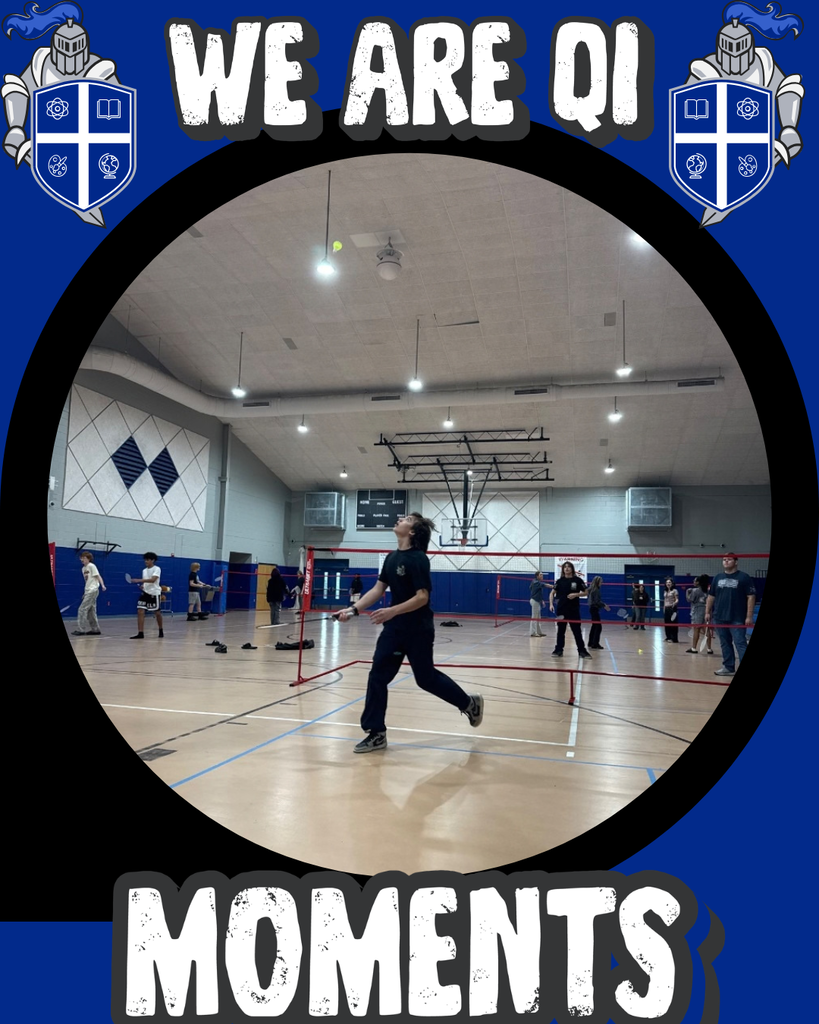 Q.I. Roberts students playing badminton together inside the school gymnasium during PreAICE Physical Education class