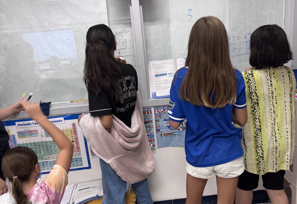 Ms. Rudolphs class working on multiplication.