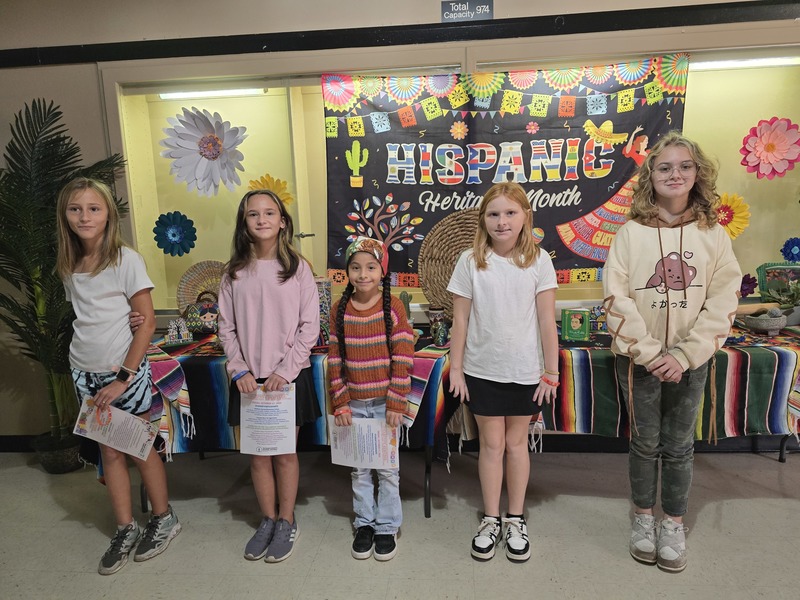 Picture of 5 students .