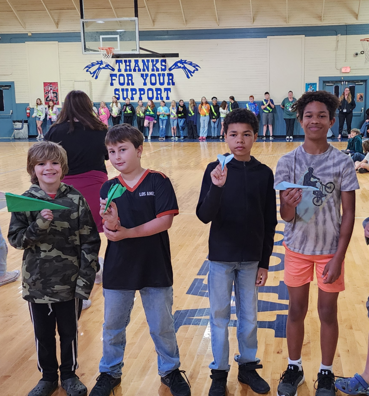 picture of top 4 3rd-6th grades who won the airplane contest.