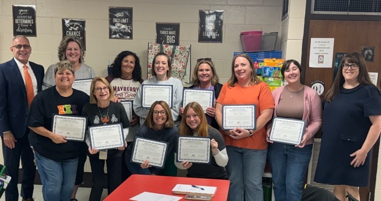 teachers holding certificates 