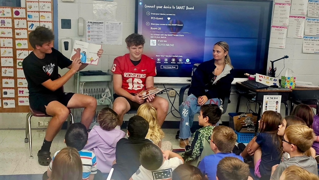 High School read aloud to first grade students