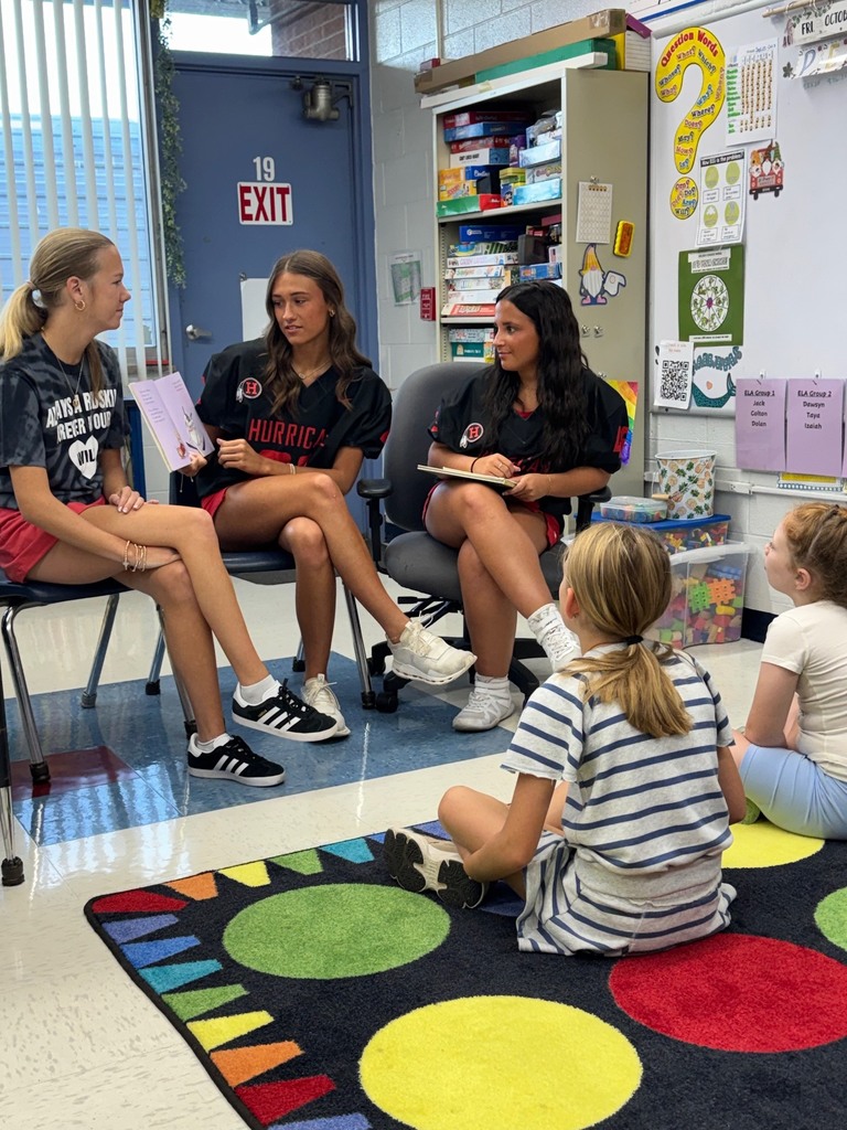 Hurricane High School students read aloud to Conner Street Students