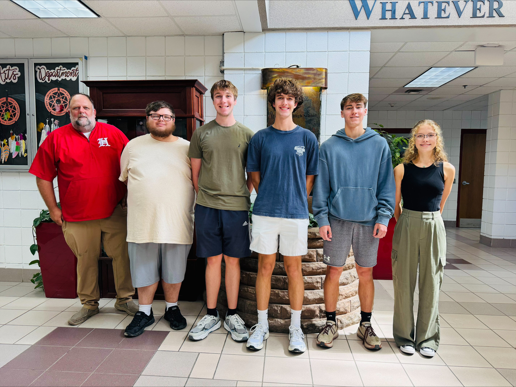 Mr. Caldwell stands with the five National Merit Semi Finalist 