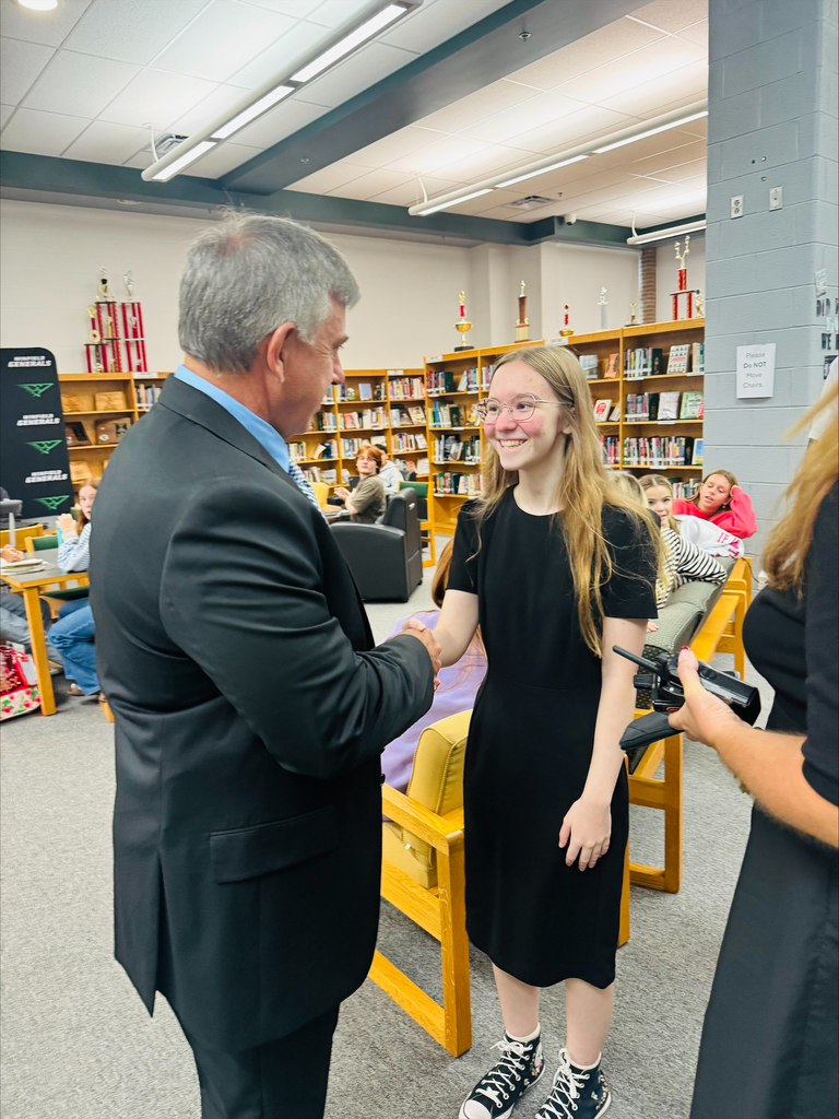 Mr. McGrew congratulates WHS student on National Merit semifinalist 